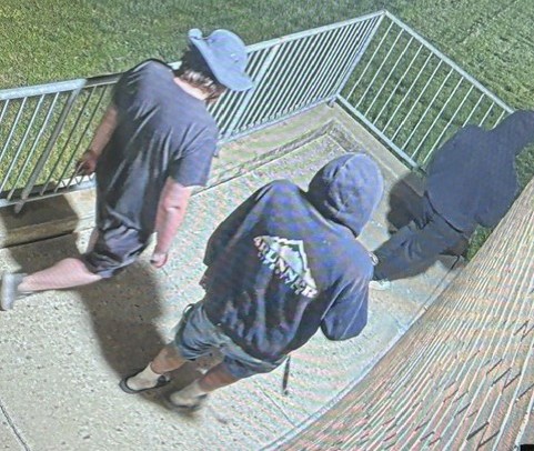 A photo of the three suspects involved in the vandalism.